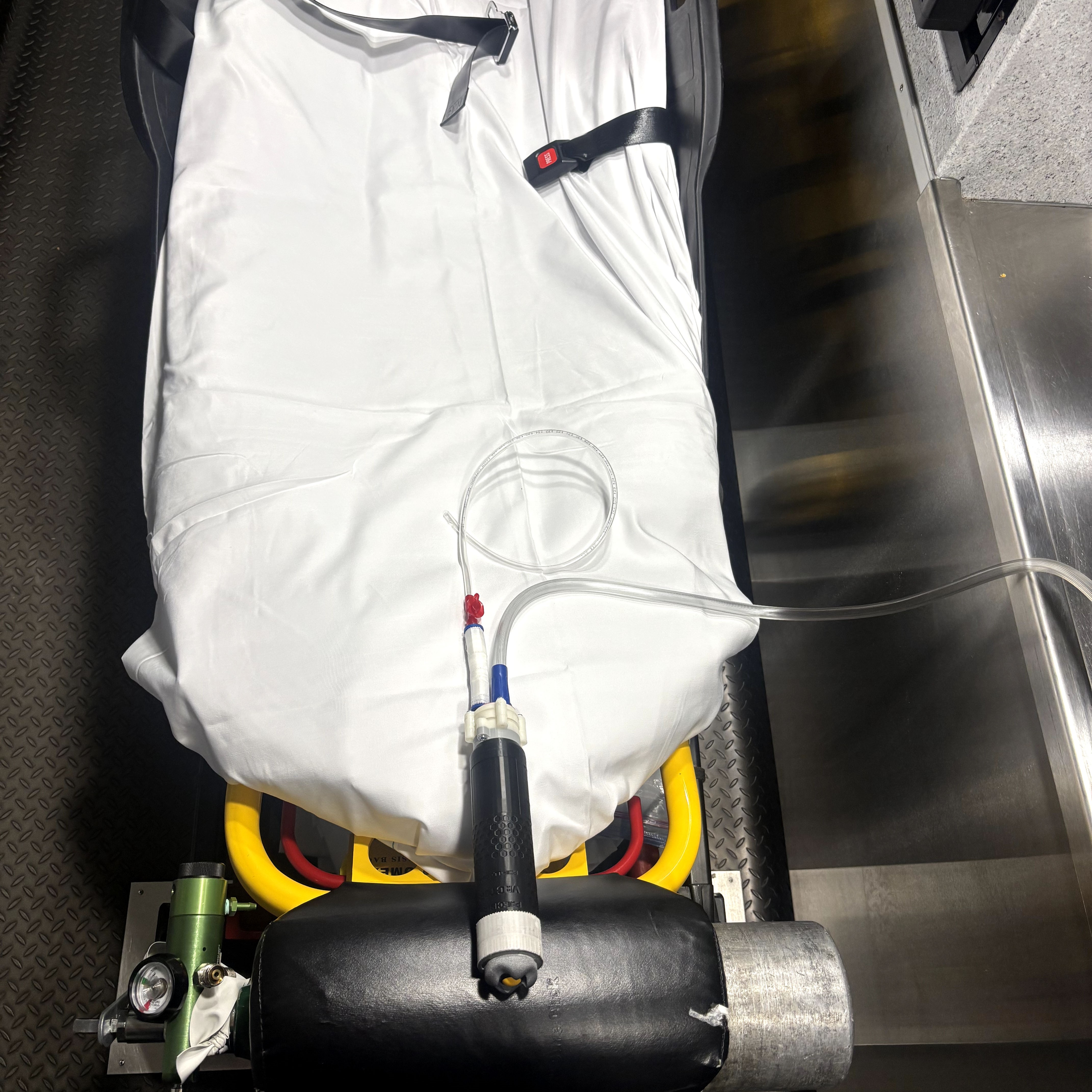 Paramedic treating a patient